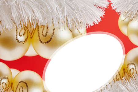 Christmas golden toys for greeting card on the red backgroundの写真素材