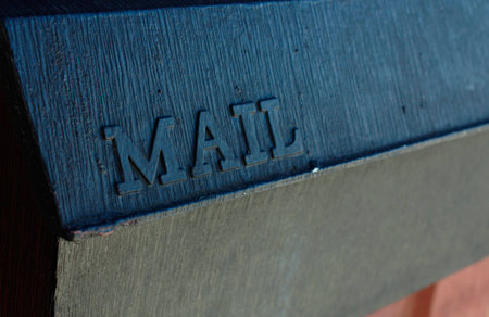 Closeup of a vintage metallic mailbox in the USA