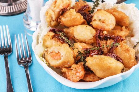 Mediterranean dish, fried butter dough with seafoodの写真素材