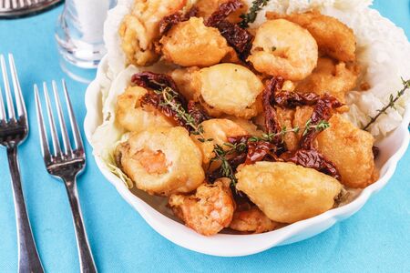 Mediterranean dish, fried butter dough with seafoodの写真素材