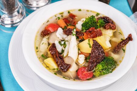 Seafood with vegetables and mushroom soupの写真素材