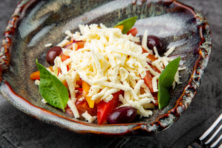 cherry tomatoes, spinach, eel, lime, cheese, side viewの写真素材
