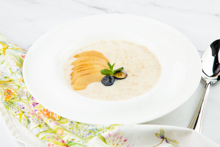 healthy breakfast with fruits in a white plate side viewの写真素材