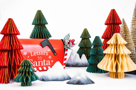 New Years background for a product or card. Colored Christmas trees, Santa Claus mailbox.の写真素材