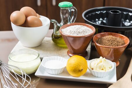 Still life with the ingredients to make a homemade sponge cake.の写真素材