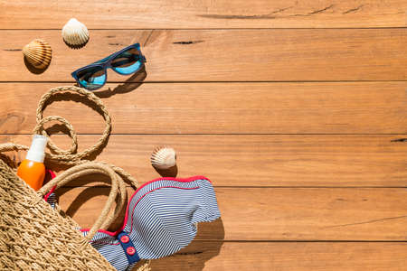 Top view of beach objects on wooden boards. Summer and vacation concept.の写真素材