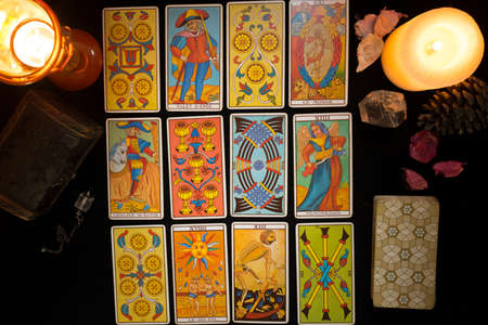 Tarot card spread to predict the future. Concept of a tarot card divination session. View from above.の写真素材