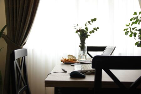 laptop working environment on deskの写真素材