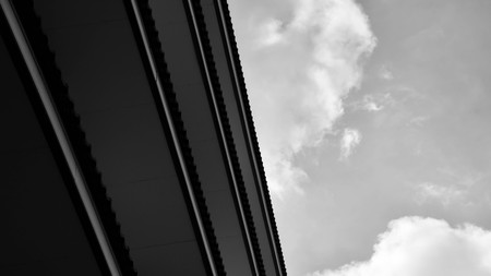 underside angle view of modern building skyscrapers roof - monochromeの写真素材