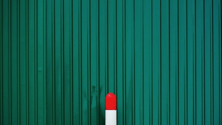 head of red and white traffic lane control stickの写真素材