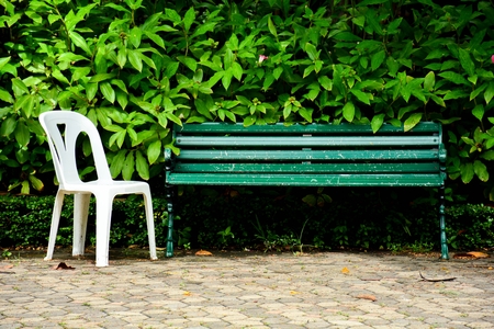antique green bench in the parkの写真素材