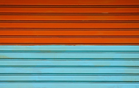 pattern and line of brown and blue vintage metal doorの写真素材