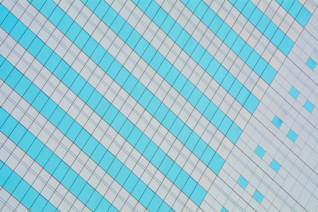 pattern of modern glass windows building skyscrapers of business center in the cityの写真素材