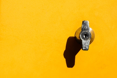 lock at yellow locker- closeupの写真素材