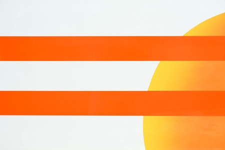 orange and yellow line on white surfaceの写真素材