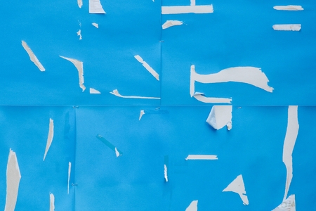 tear blue paper backgroundの写真素材