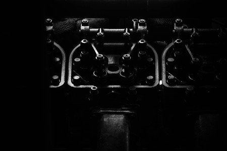 valve of old engine in the dark - background