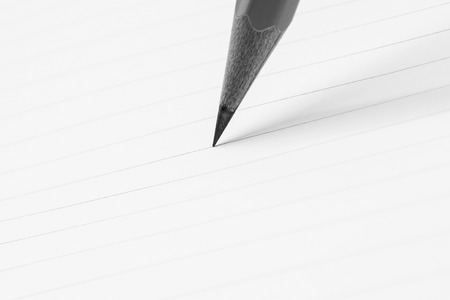 close up of pencil writing on a paper - for business conceptの写真素材