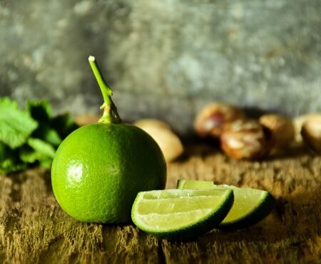 green fresh lemons - backgroundの写真素材