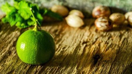 green fresh lemons - backgroundの写真素材