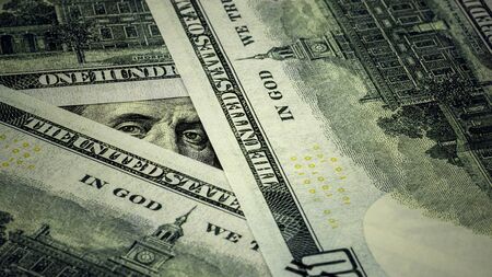 Benjamin Franklin's look on a hundred dollar bills.
