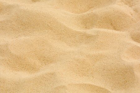closeup of sand pattern of a beach in the summer
