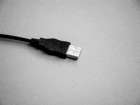 Cable connector USB on grey backgroundの写真素材