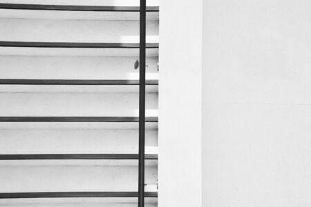 concrete ladder with shadow in the city - monochrome