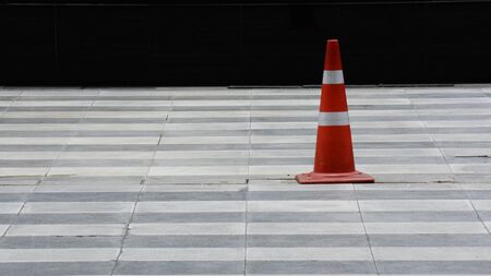 Traffic cone on pavementの写真素材