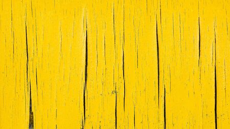 damaged of old yellow boardの写真素材