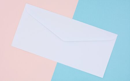 white envelope mail on pink and blue background