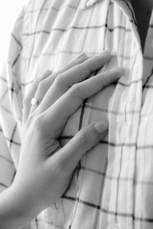 hand of woman with wedding ringの写真素材