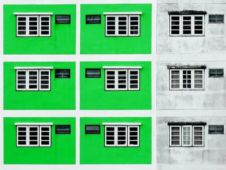 glass window of green concrete buildingの写真素材