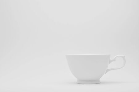 White ceramic cup on a white background