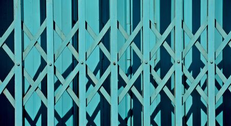 blue steel sliding door with light and shadowの写真素材