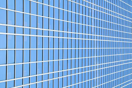 pattern of modern glass windows building skyscrapers of business center in the cityの写真素材