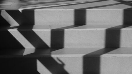 shadow from the window on staircase - monochromeの写真素材