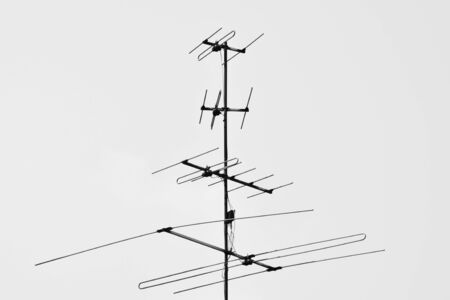 old television antenna at home in rural on pale white backgroundの写真素材