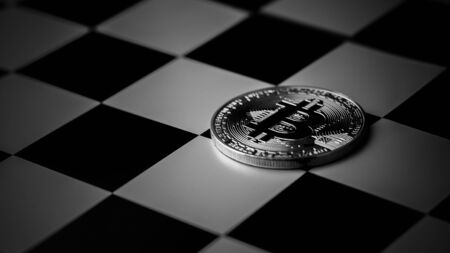 bitcoins on chess board in the dark. - business and economy in the future concept.の写真素材