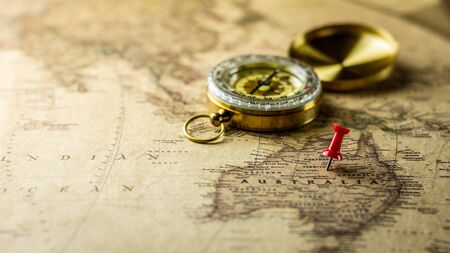 single red pushpin marking a location on australia map.の写真素材