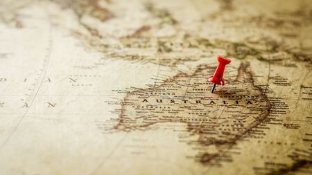 single red pushpin marking a location on australia map.