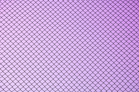 Wire mesh steel on purple background - silhouetteの写真素材