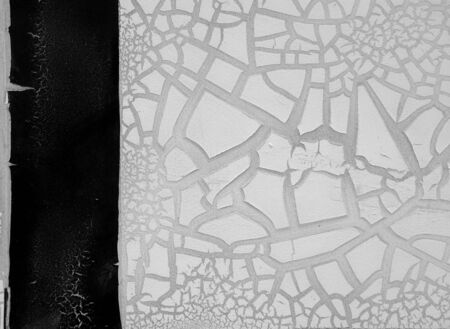 detail of cracked paint on wall. black and whiteの写真素材