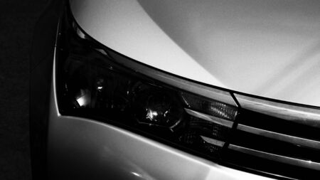 Car headlight - light and shadowの写真素材