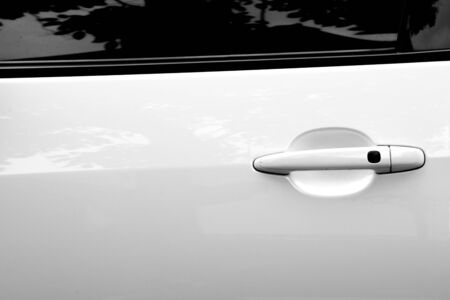 white car door handleの写真素材