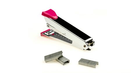 Pink stapler isolated on a white background.