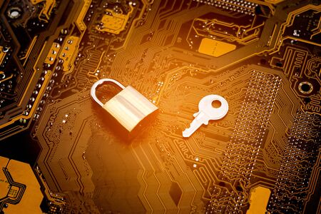 Locks and keys on computer circuit board. - security and safety computer concept.