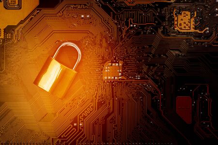 Lock on computer circuit board. - security and safety computer concept.