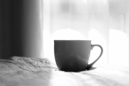 coffee cup on the bed
