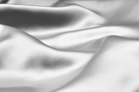 Silver wavy silk background textureの写真素材